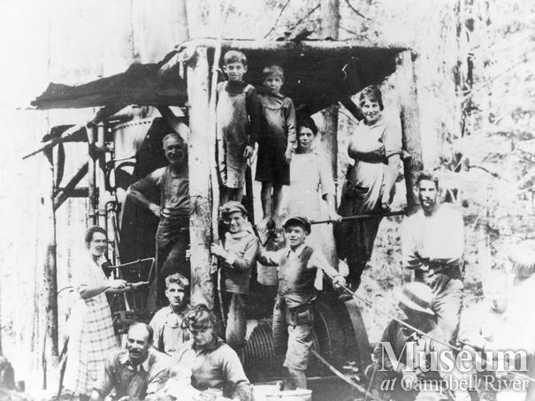 Group of people on steam donkey on Read Island