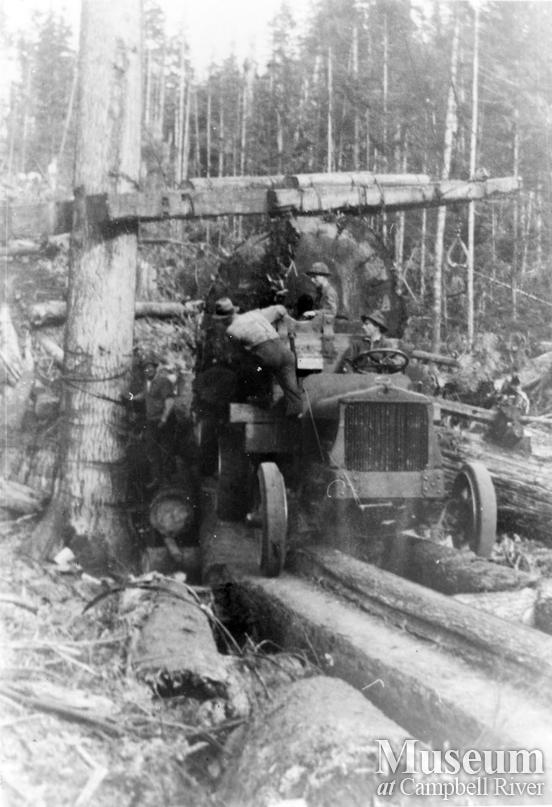 Loading a logging truck at Port Neville