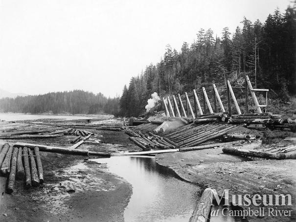 Unloading logs at Rock Bay