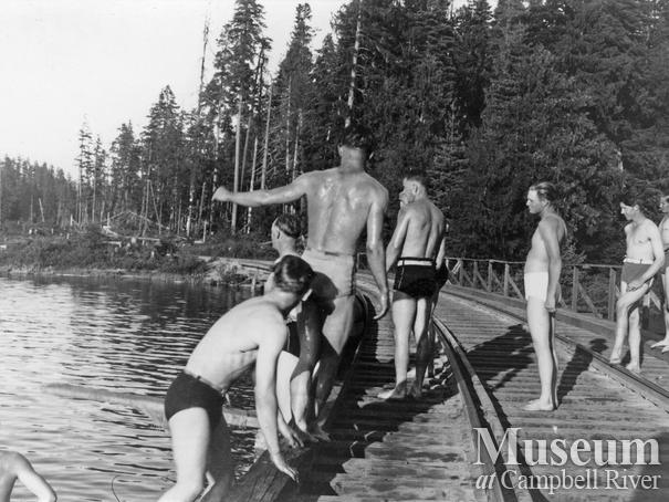 Elk River Timber Co. loggers on a swim break