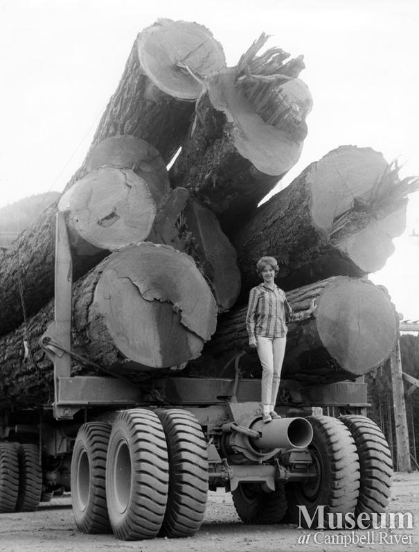 A truck loaded with big timber