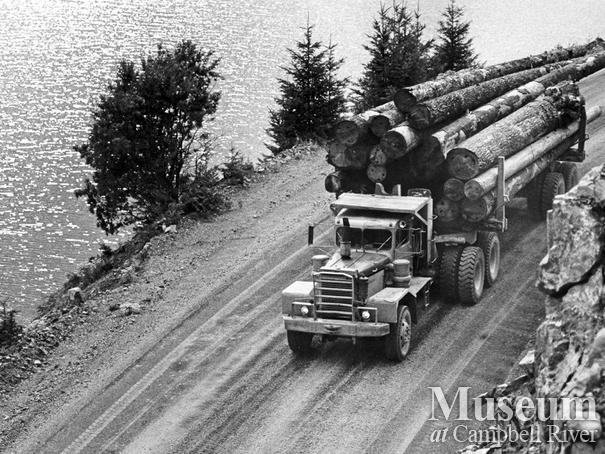 Logging truck with a load of logs