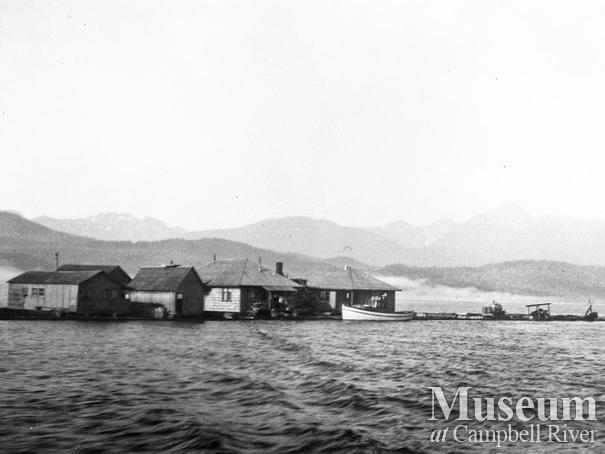 Bendickson Logging camp being moved on floats