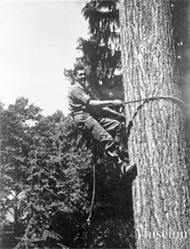Ernie Alexander competing in a loggers sports event