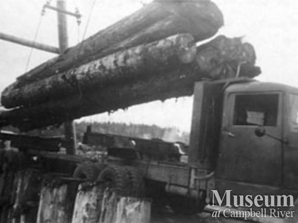 Unloading a Pioneer Timber Co.logging truck