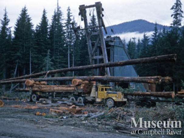 Loading TV tower poles near Woss camp